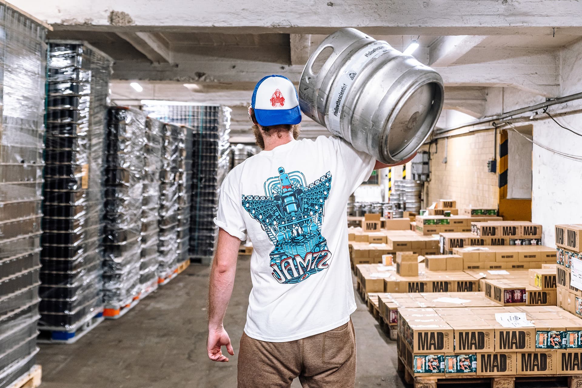 Custom screen printed brewery merchandise featuring detailed illustrated brand designs