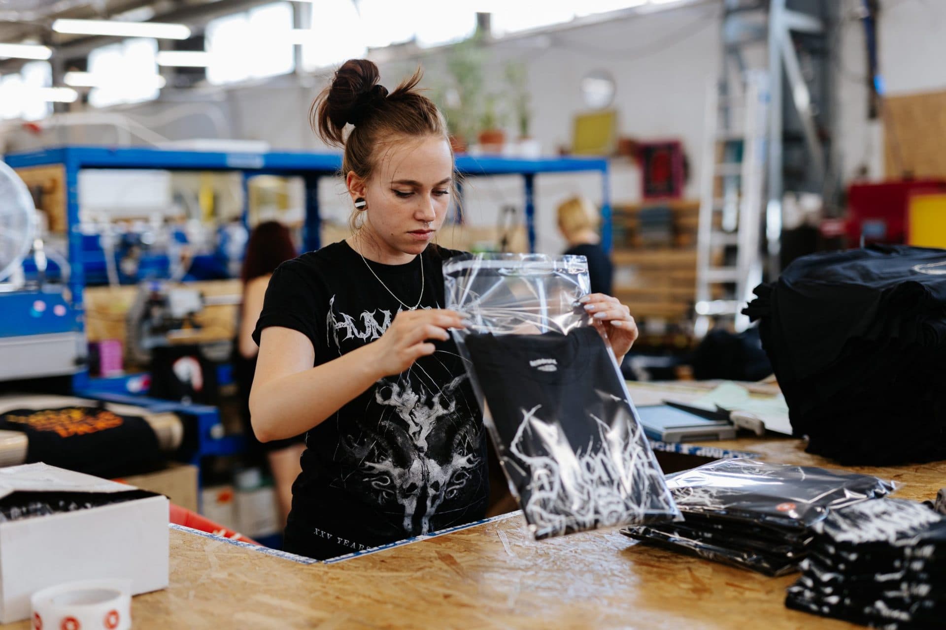 Careful merchandise packaging in protective poly mailers for safe band tour delivery