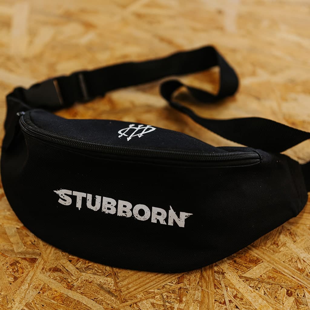 Custom printed STUBBORN brand fanny pack with white transfer text on black fabric